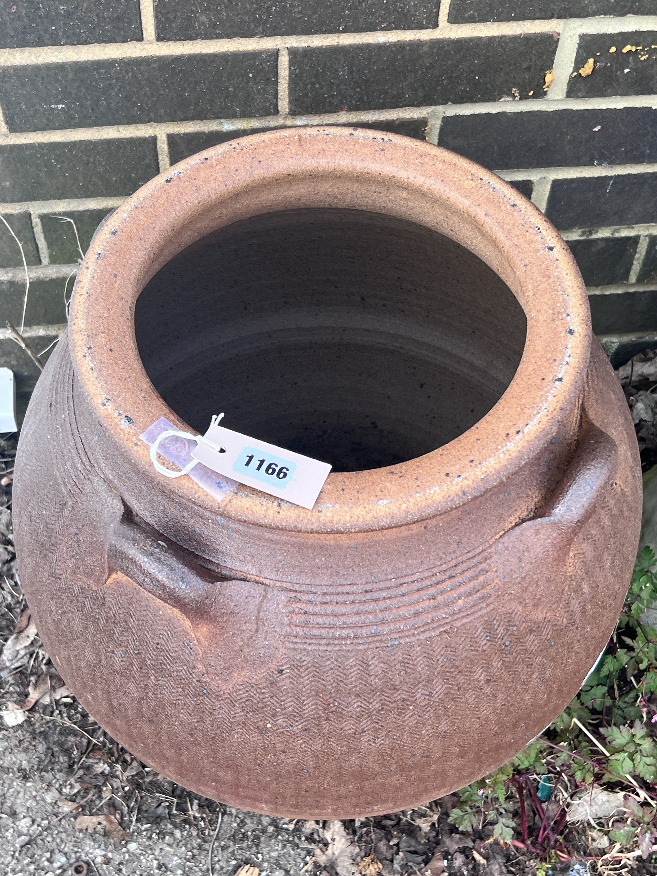 A circular salt glazed stoneware storage vessel, diameter 44cm, height 52cm